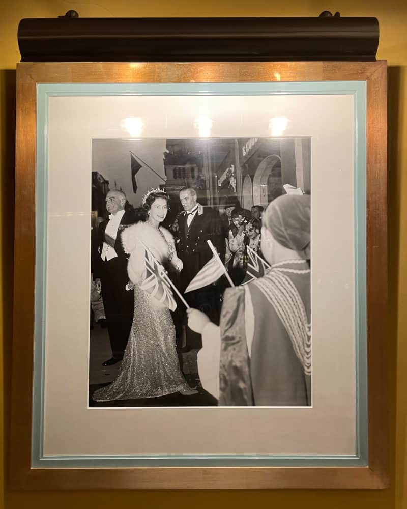 Photograph of Queen Elizabeth in Claridge's lobby, London.