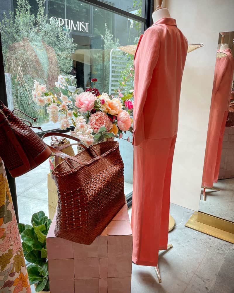 Peach jacket and trousers on mannequin at Sézane pop-up store.