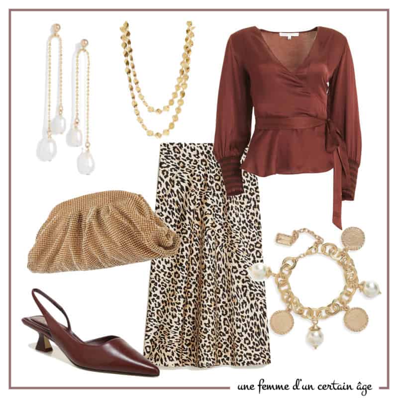 Special occasion outfit idea with a leopard print skirt, silk blouse and gold jewelry