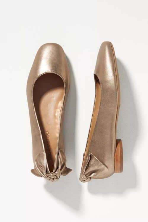 Bernardo Eloise ballet flats in gold with bow on heel.