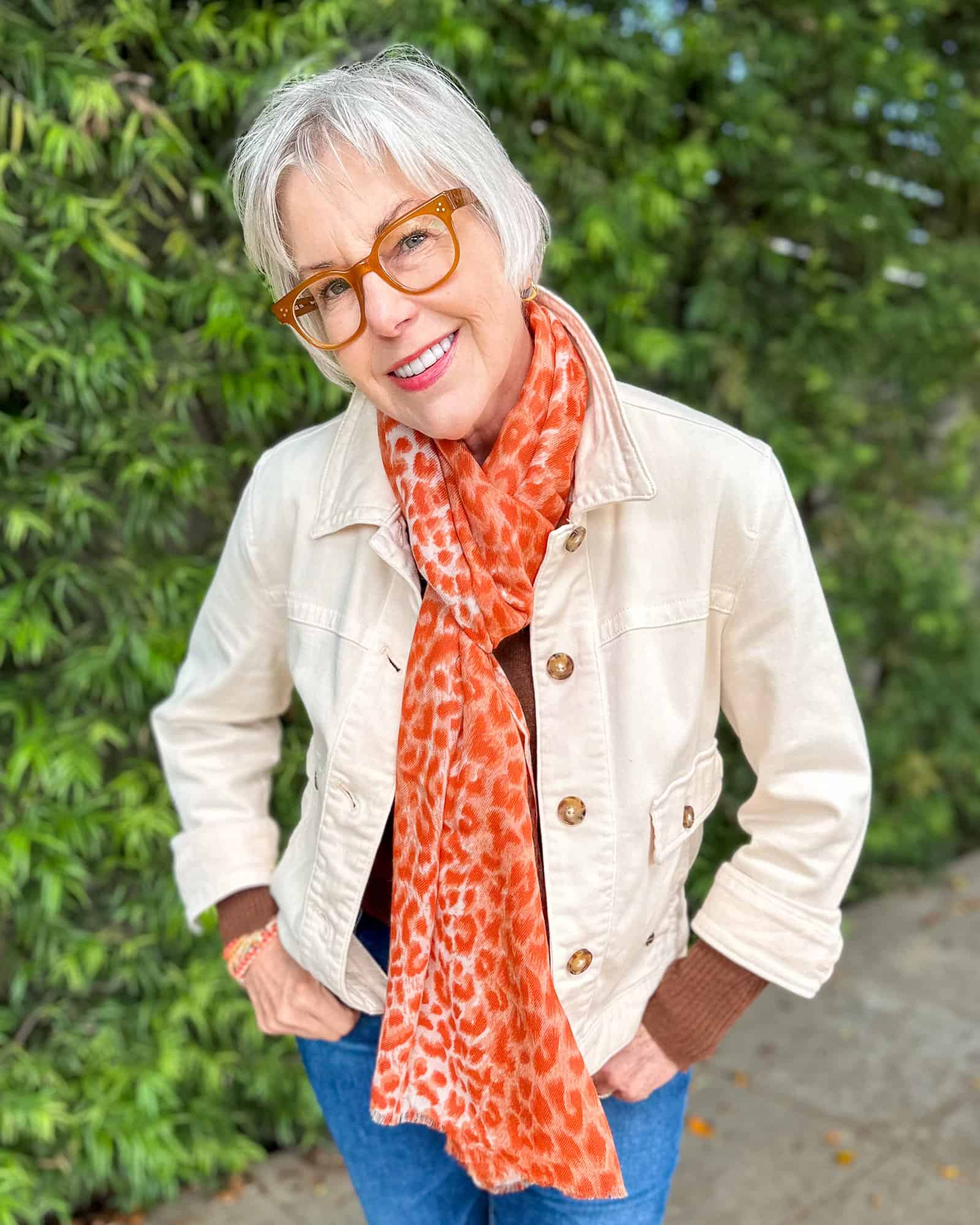 Susan B wears the Spring coral leopard scarf from BLACK UK