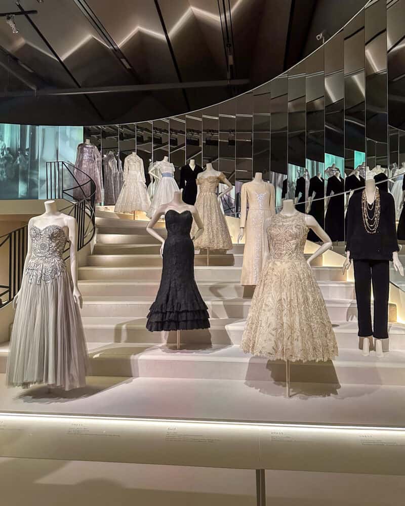 A mockup of the mirrored staircase at 31 rue Cambon with Chanel evening wear.