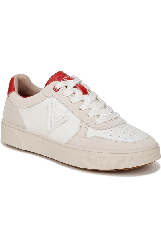 Vionic court sneaker with red accents.
