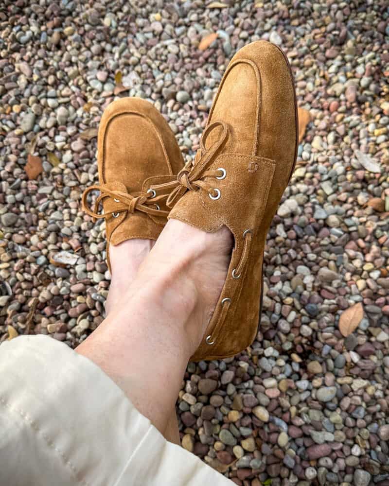 Susan B. wears Vince suede boat shoe lace-up loafers in toffee brown.