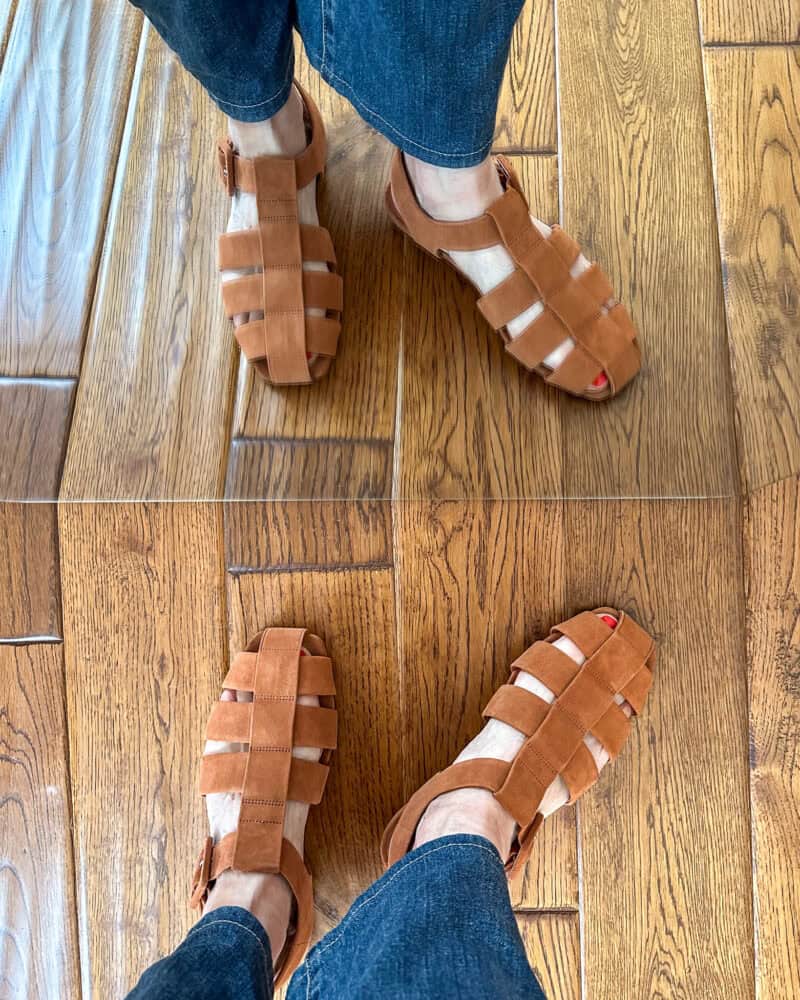 Detail: Susan B. wears Everlane brown suede fisherman sandals.