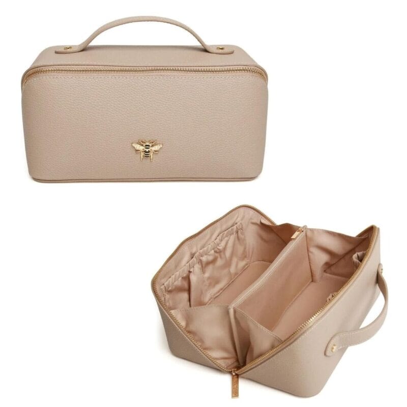 Alice Wheeler "Train Case" travel bag for cosmetics.