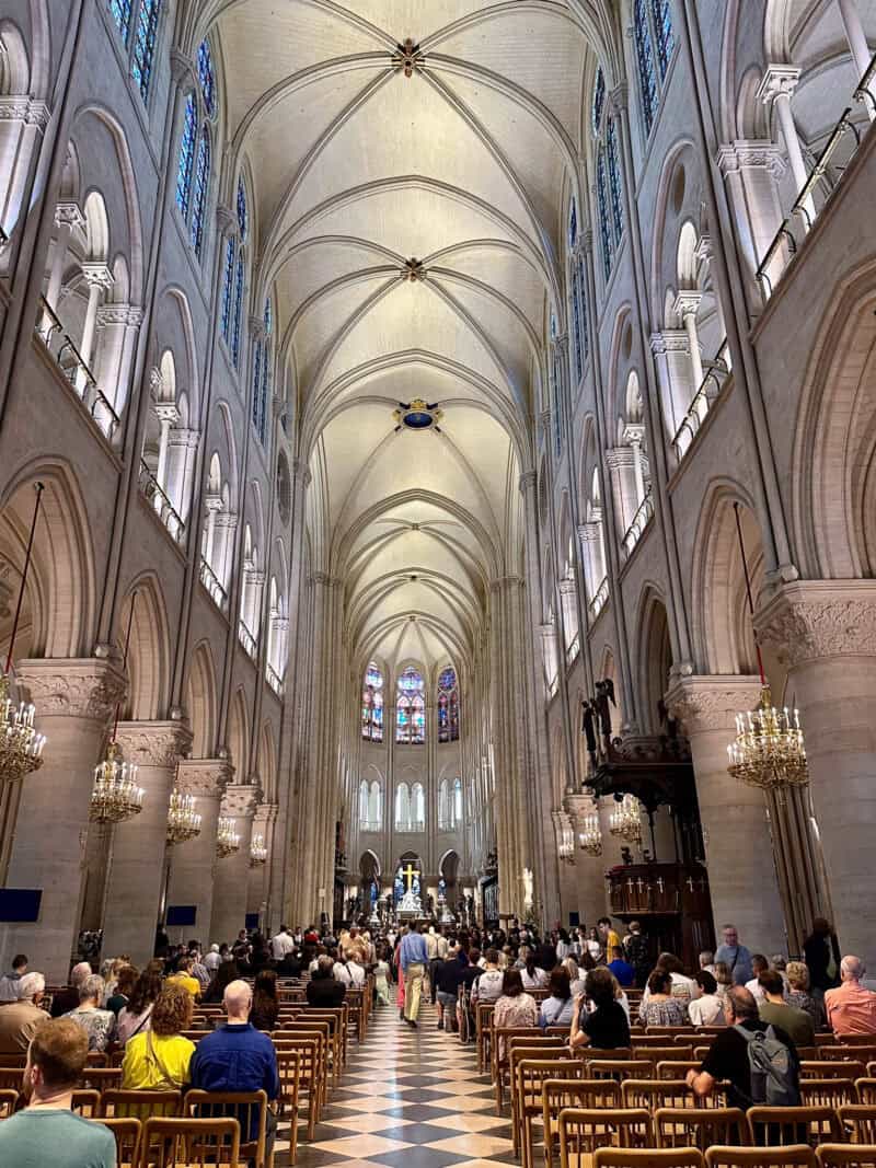 Interior of newly-refurbished Notre Dame cathedral, Paris.