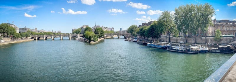 panoramic view of Paris from Pont des Arts on the Seine, looking toward Ile de la Cite.