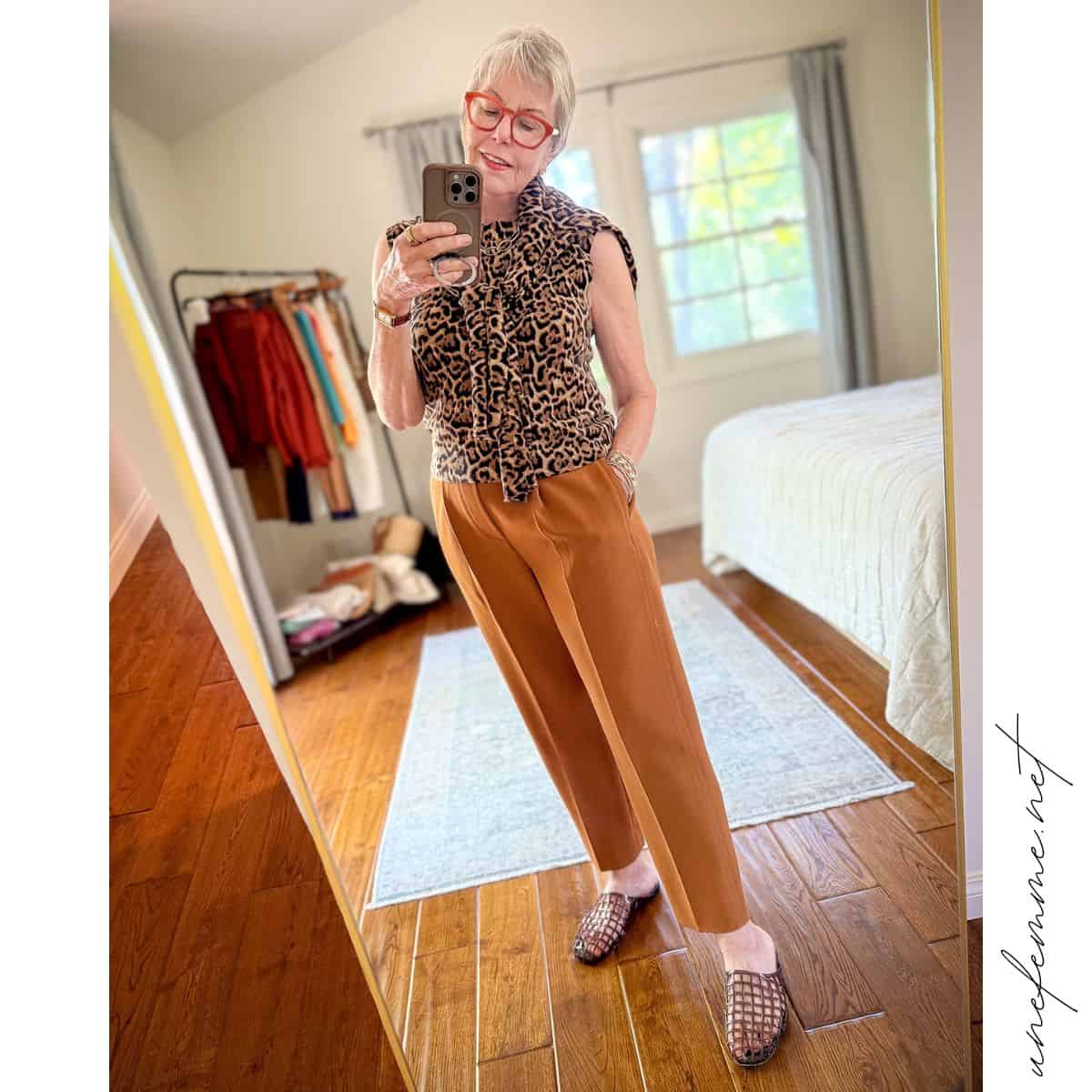 Vince pleated trousers, worn with a J.Crew leopard print twinset and Vince Barcelona jelly slides.