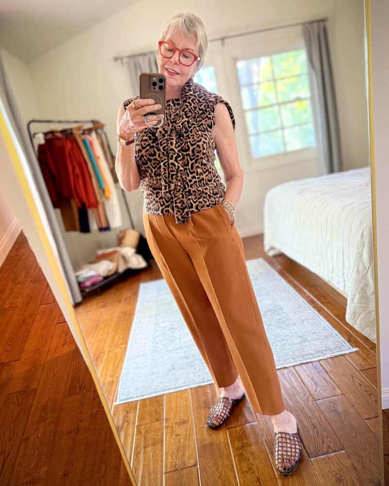 Vince pleated trousers, worn with a J.Crew leopard print twinset and Vince Barcelona jelly slides.