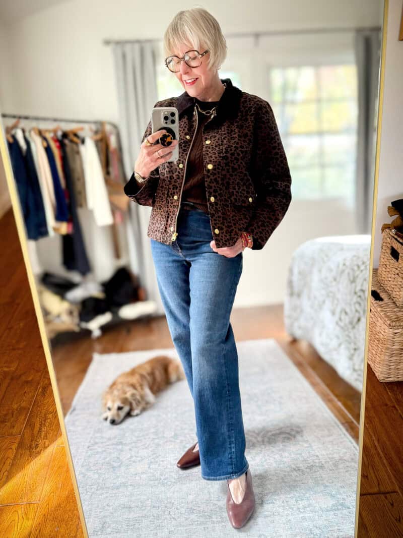 Leopard print field jacket styled with straight-leg jeans, a neutral sweater tee, and casual shoes for an easy spring outfit