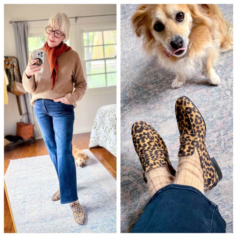 Susan B. wears a classic casual outfit with cashmere fisherman sweater, knit triangle scarf, straight-leg jeans, leopard loafers. Bella (the dog) photobombs.