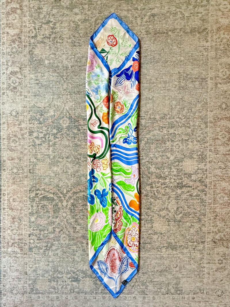 Silk square scarf classic bias fold, starting at opposite corners.