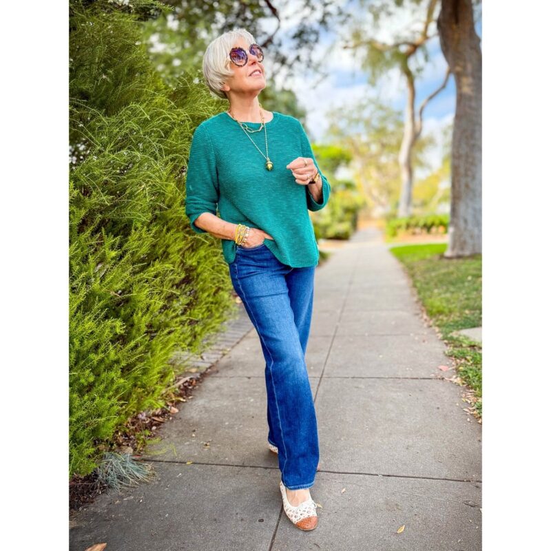 Teal Eileen Fisher linen-cotton sweater styled with jeans for fall.