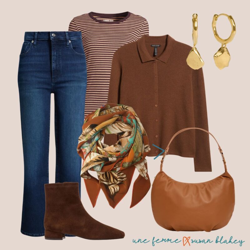 Fall travel outfit idea with straight leg jeans, striped layering tee, brown collared cardigan, print silk scarf, gold earrings, brown suede boots and brown leather crescent bag.