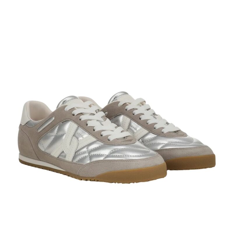 Veronica Beard Natalia slip-on sneakers in silver.